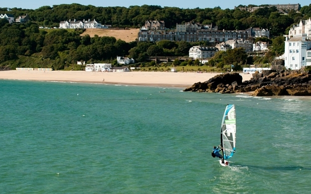 Undated handout photo issued by Edward Buchanan of Jono Dunnett who is set to become the first person to windsurf around Great Britain without support as he completes his 2,200 mile journey this week. PRESS ASSOCIATION Photo. Issue date: Wednesday September 9, 2015. Jono Dunnett set off from Clacton Pier in Essex on June 7 and is now on the home stretch as he stopped over in Suffolk last night. The 41-year-old has dodged ferries and whirlpools, slept in a makeshift tent made of his sail and relied on the kindness of strangers as he took on his epic journey. See PA story ADVENTURE Windsurfer. Photo credit should read: Jono Dunnett/PA Wire NOTE TO EDITORS: This handout photo may only be used in for editorial reporting purposes for the contemporaneous illustration of events, things or the people in the image or facts mentioned in the caption. Reuse of the picture may require further permission from the copyright holder.