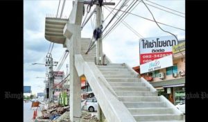 Mysterious footbridge with power pole built into it went viral around world & nicknamed "Stairway to heaven"