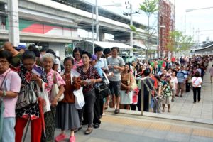 People line up to register for free test run tickets for the Purple Line on June 5 at MRT Khlong Bang Phai in Bangkok.