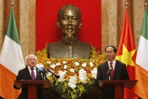 Irish President Michael Higgins (left) speaks to reporters as his Vietnamese counterpart Tran Dai Quang listens during a joint press briefing in Hanoi on Monday.